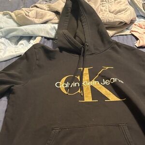 Calvin Klein Jeans Black Hoodie with Gold Accents